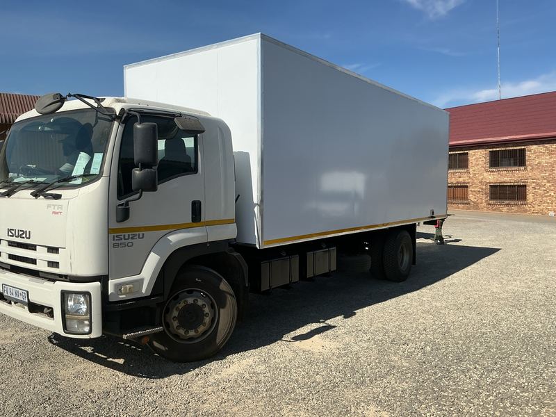 A finished box body outside a vehicle body-building workshop